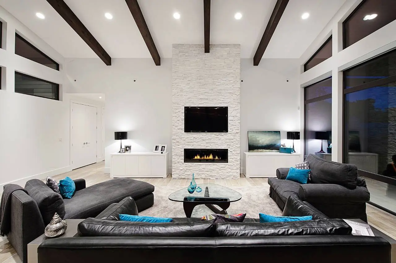 Elegant lounge area with black sofas