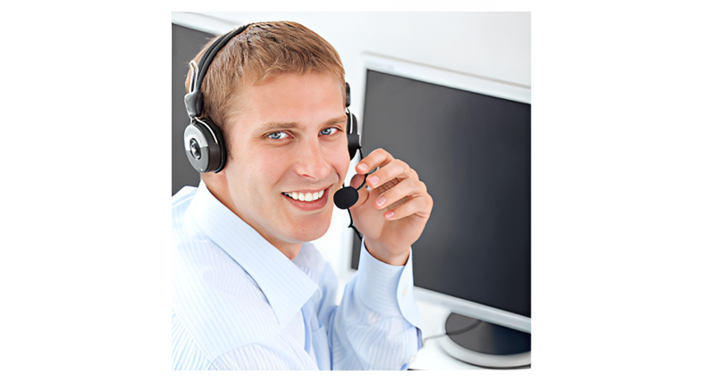 Person working at computer with headset